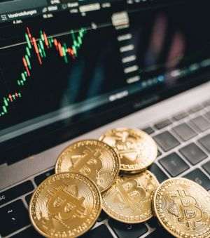 MarketWatch: Deprecierea dolarului pune aurul şi Bitcoinul în prim-planul temelor investiţionale din 2025